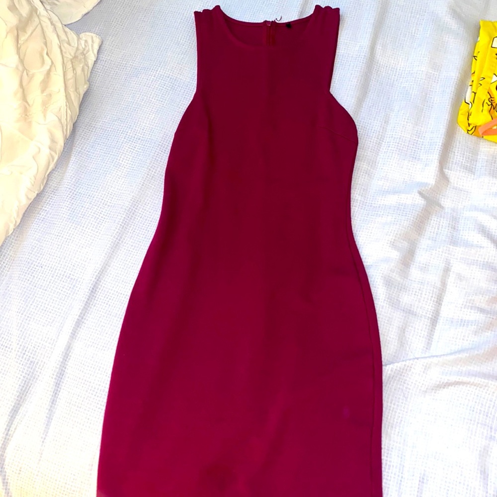 Excellent condition, tight fit, purple/burgundy color, size small